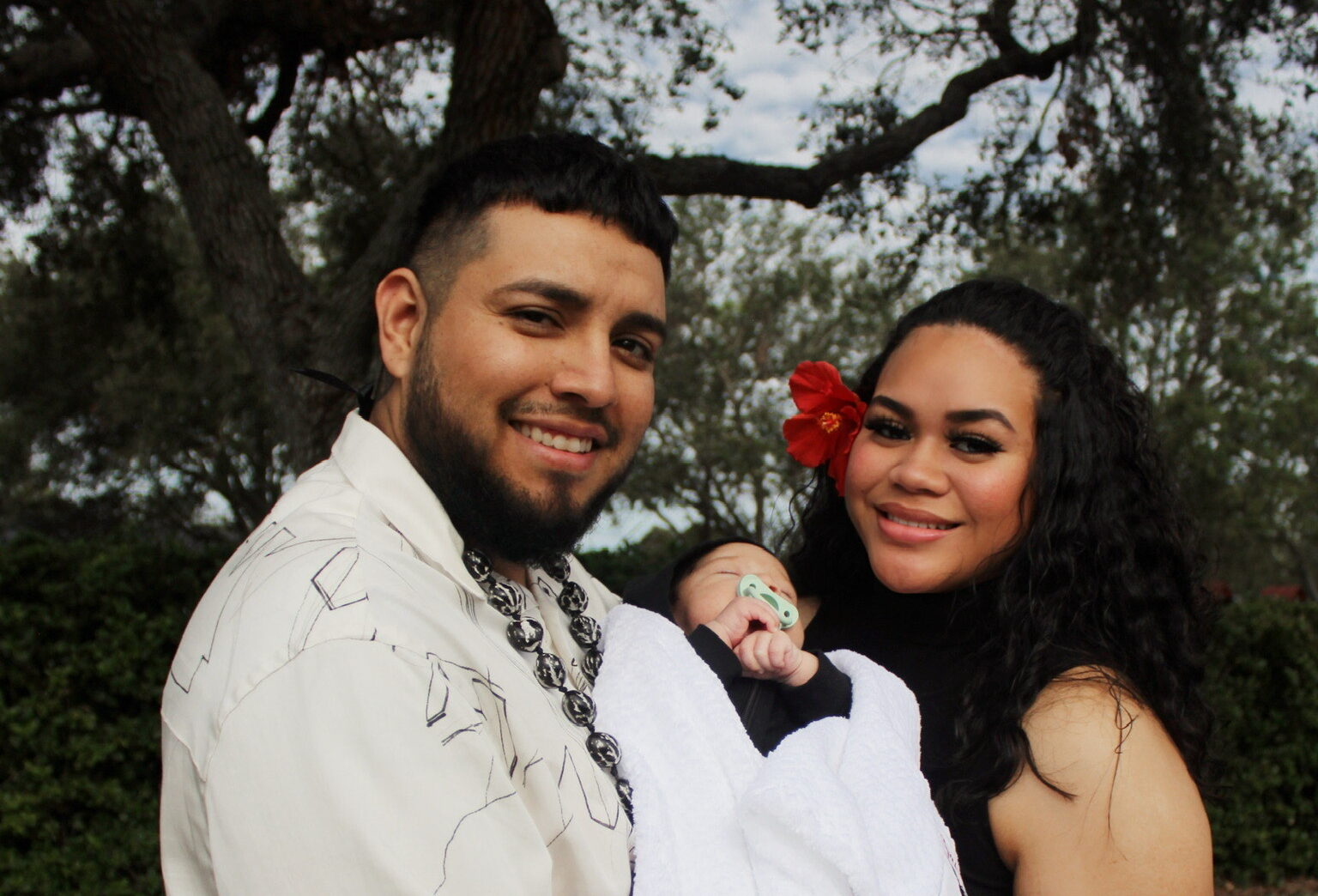 couple holding new baby